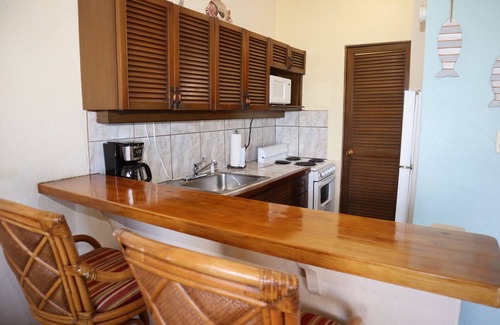 Frydendal Condo | Prime Location with Pool and Breathtaking Ocean Views