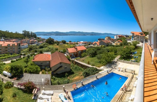 Raxo Apartment | Oceanfront Retreat in Poio with Pool and Spa Amenities
