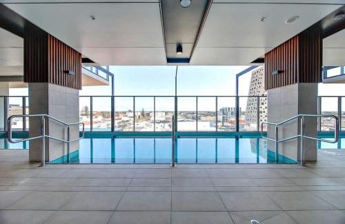 Adelaide Central Business District Apartment | Experience Pokémon Inspired Retreat with Pool and Gym