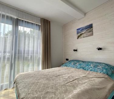 Poddabie Apartment | Enjoy a Cozy Double Room by the Beach in Poddąbie