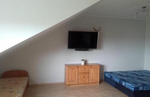 Rewa House | Pet-Friendly Pokoje Gościnne R10 with Family Amenities