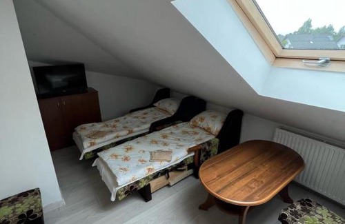 Radzymin Hotel | Child-Friendly Comfort at Pokoje ZIELONY ZAKĄTEK