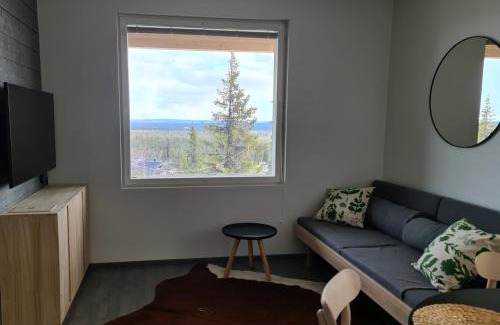 Yllas Apartment | Cozy Polar Charm: Child-Friendly Retreat Rated 8.6/10