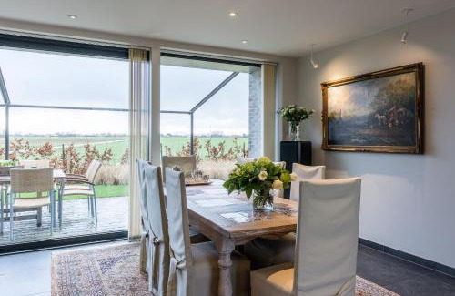 Watervliet House | Welcoming Polderwoning 'Cleylantshof': 4-Star Family Retreat