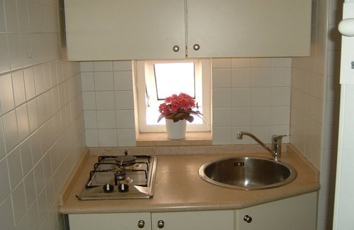 Polignano a Mare House | Polignano a Mare: Red Flowers House with Ocean Views