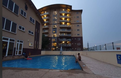 Accra Apartment | Polo View Airport Stop: Relax with Pool & Spa Amenities