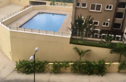 Accra Apartment | Polo View Airport Stop: Relax with Pool & Spa Amenities