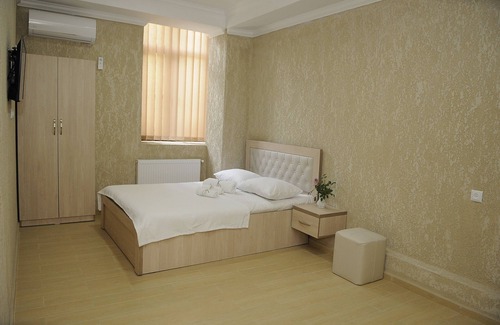Kutaisi Hotel | Cozy Pomegranate Double Room with Delightful Breakfast