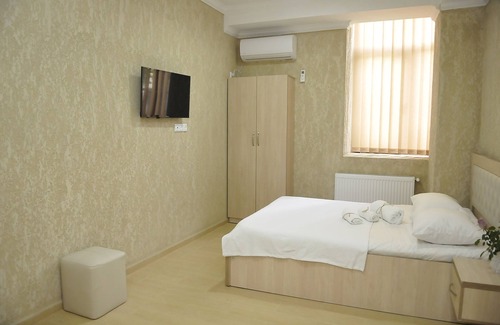 Kutaisi Hotel | Cozy Pomegranate Double Room with Delightful Breakfast