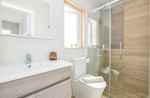Es Grau Apartment | Ponent-Beachfront Apartment: Relaxing Coastal Retreat Awaits