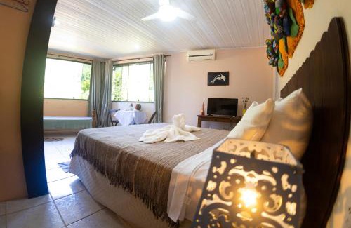 Ilha Grande House | Cozy Ponta Da Barca: Oceanfront Retreat with Spa & Dining