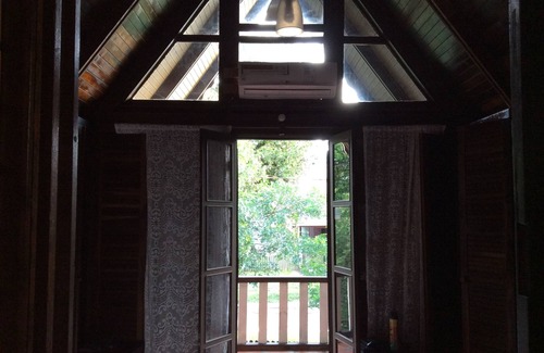 Pontal do Sul House | Inviting Swiss Chalet with Ocean View & Spa Amenities