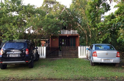 Pontal do Sul House | Inviting Swiss Chalet with Ocean View & Spa Amenities