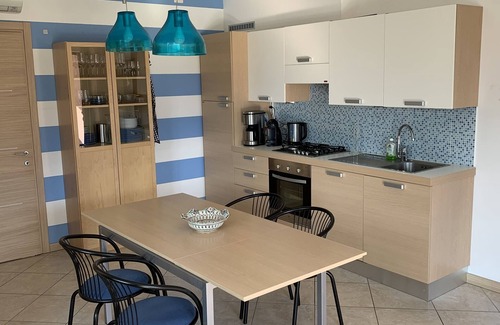 Colico Piano Apartment | Tranquil Pool Apartment with Ocean Views in Central Location