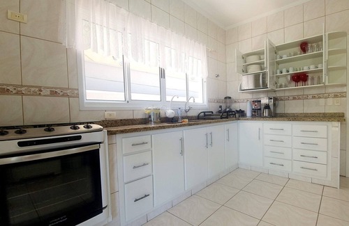 Praia dos Sonhos House | Relaxing Retreat with Pool, Gourmet Balcony & Steps to Beach
