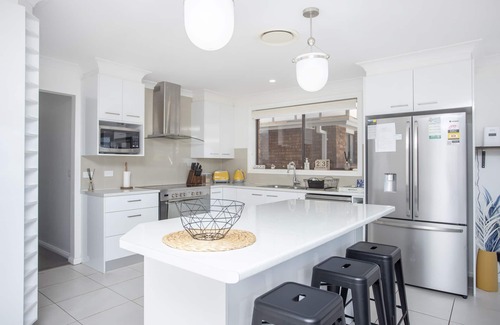 Forster House | Experience the Canalfront Pool House with Private Jetty