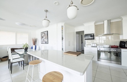 Forster House | Experience the Canalfront Pool House with Private Jetty