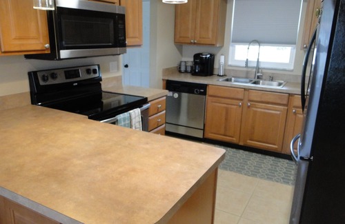 Cypress Lakes Estates House | Paradise Central: Inviting 3 BR Home with Heated Pool
