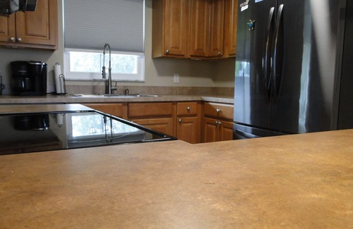 Cypress Lakes Estates House | Paradise Central: Inviting 3 BR Home with Heated Pool