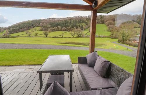 Meifod House | Serene Pool View Retreat with Child-Friendly Amenities