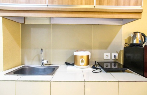 Tangerang Apartment | Pool View Studio at Ara Residence: Family-Friendly Retreat
