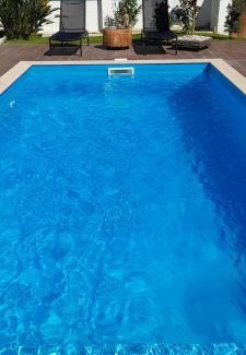 Fernao Ferro Apartment | Experience Poolemonhouse: Oceanfront Bliss with Pool Access