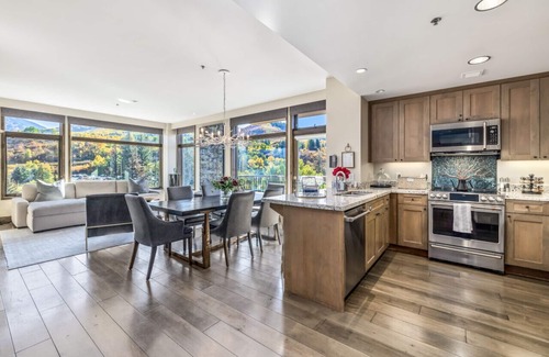 Avon Condo | Guest Rated 10/10: Pop Art Riverfront Ski Retreat with Pool