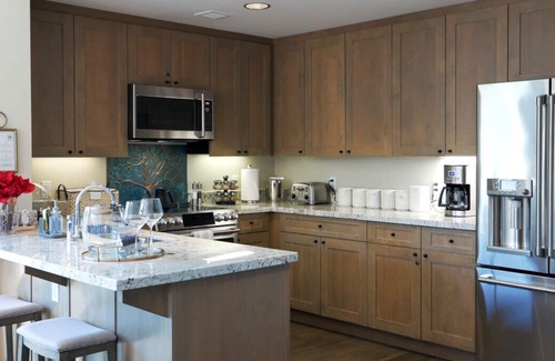 Avon Condo | Guest Rated 10/10: Pop Art Riverfront Ski Retreat with Pool