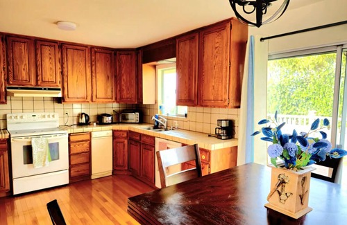 Half Moon Bay House | Pet-Friendly Poplar Beach Home with 9.8/10 Guest Rating