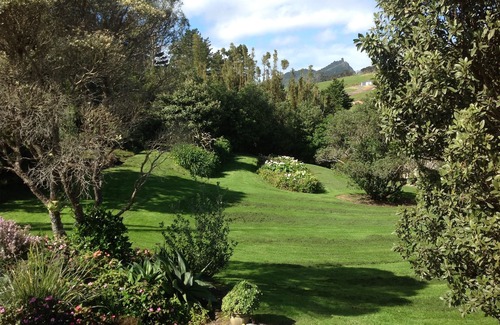 Whangarei Heads Cabin | Discover Urquharts Bay: Beach Cabin with Private Garden