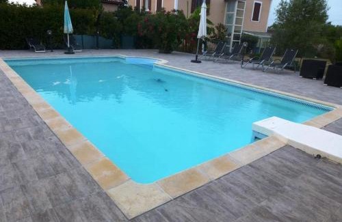 Brens House | Discover Port Bas: Oceanfront Retreat with Pool Access
