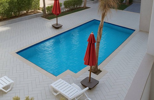 Al-Manasrah Ski Chalet | Explore Port Said: Family-Friendly Hotel with Pool Access