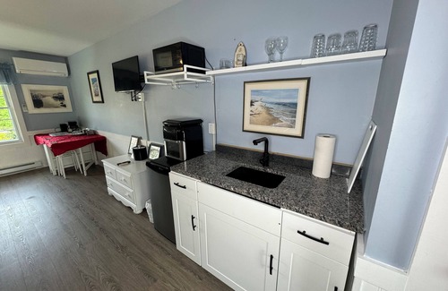 Wolfville Bed & Breakfast | Downtown Port Williams Room with King Bed and Patio Access