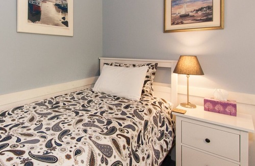 Wolfville Bed & Breakfast | Downtown Port Williams Room with King Bed and Patio Access