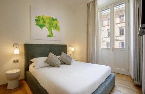 Rione XIV Borgo Apartment | Discover Porta Castello: 4-Star Family-Friendly Retreat