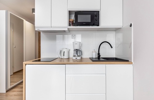 Dziwnowek Apartment | Cozy Studio at Porta Mare with Balcony & Ocean View