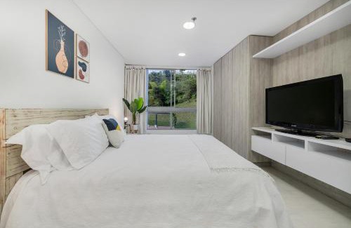 Rionegro Apartment | Relax at PORTANOVA Suites by ADVENTU with Pool & Spa