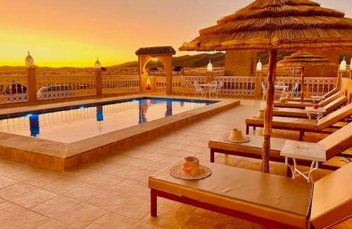 Taouz Hotel | Discover Porte De Sahara Ouzina: Family-Friendly Retreat