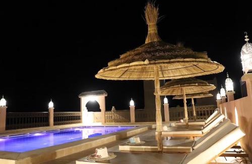 Taouz Hotel | Discover Porte De Sahara Ouzina: Family-Friendly Retreat