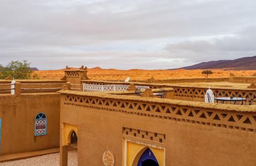 Taouz Hotel | Discover Porte De Sahara Ouzina: Family-Friendly Retreat