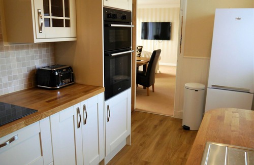 Sandyhills Cottage | Portling View: Family-Friendly Apartment for 6 with Breakfast