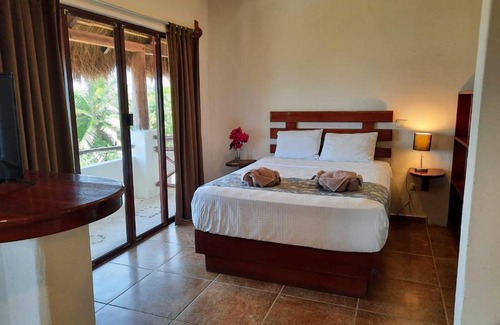 Mahahual Hotel | Discover Porto Coral Hotel & Suites: Pet-Friendly Getaway