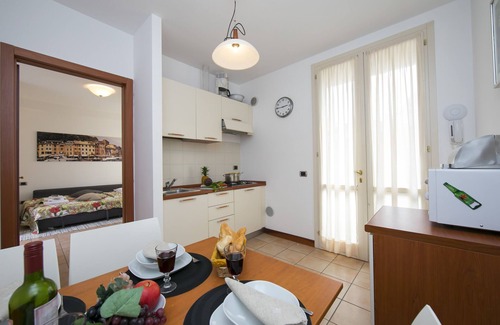 Porlezza Apartment | Porto Letizia Begonia 6: Oceanfront Family Getaway in Italy