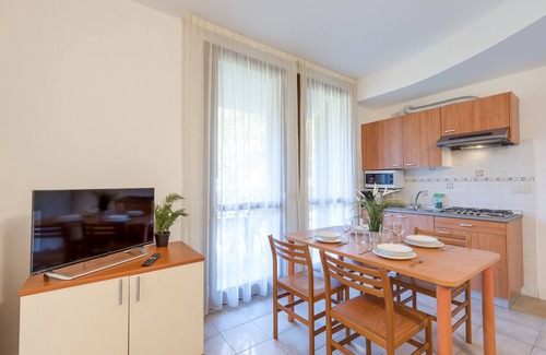Porlezza Apartment | Discover Porto Letizia: Family & Pet-Friendly Retreat