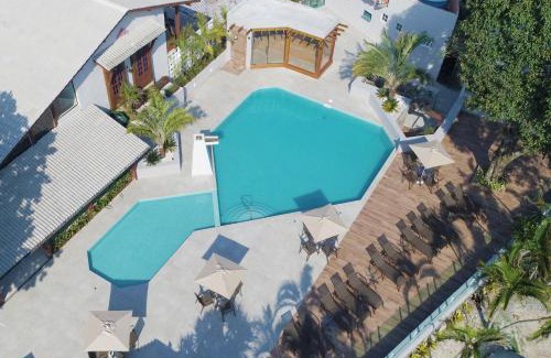 Praia do Pauba Hotel | Oceanfront Porto Paúba: Family-Friendly Oasis with Pool