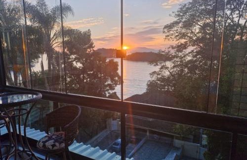 Conceicao de Jacarei Apartment | Vista Serra: Beachfront Retreat with Ocean Views & Pool