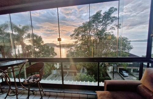 Conceicao de Jacarei Apartment | Vista Serra: Beachfront Retreat with Ocean Views & Pool