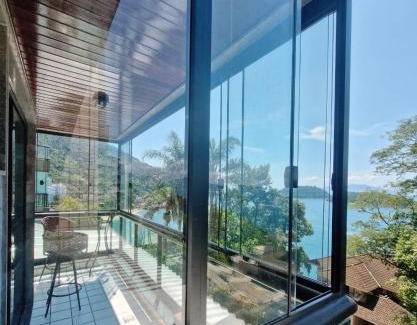 Conceicao de Jacarei Apartment | Vista Serra: Beachfront Retreat with Ocean Views & Pool