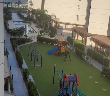 Al-Manasrah Apartment | Discover Porto Said: 4-Star Retreat with Private Beach & Pool