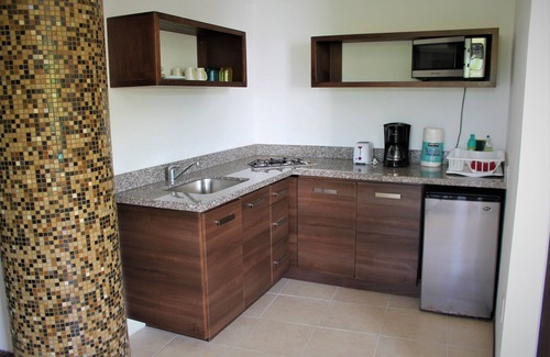 Mahahual Condo | Ocean View Apartment in Portofino - Your Coastal Escape